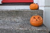 pumpkins on a door step 